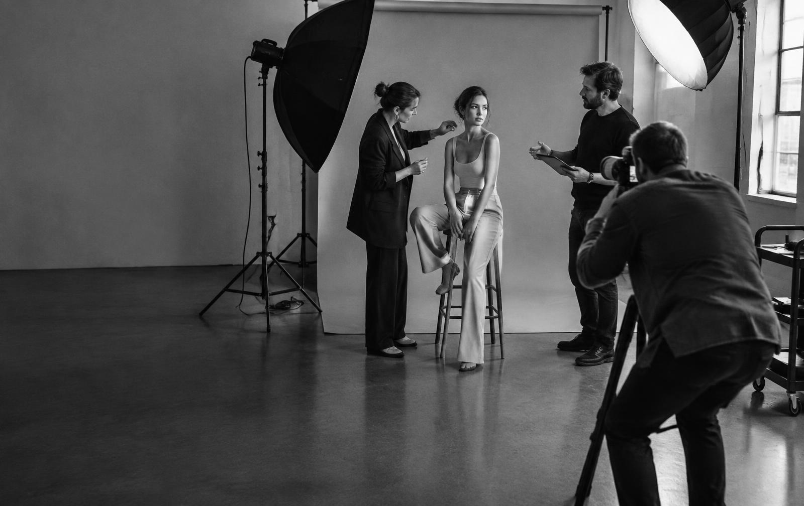 Black and white behind-the-scenes editorial magazine photo shoot