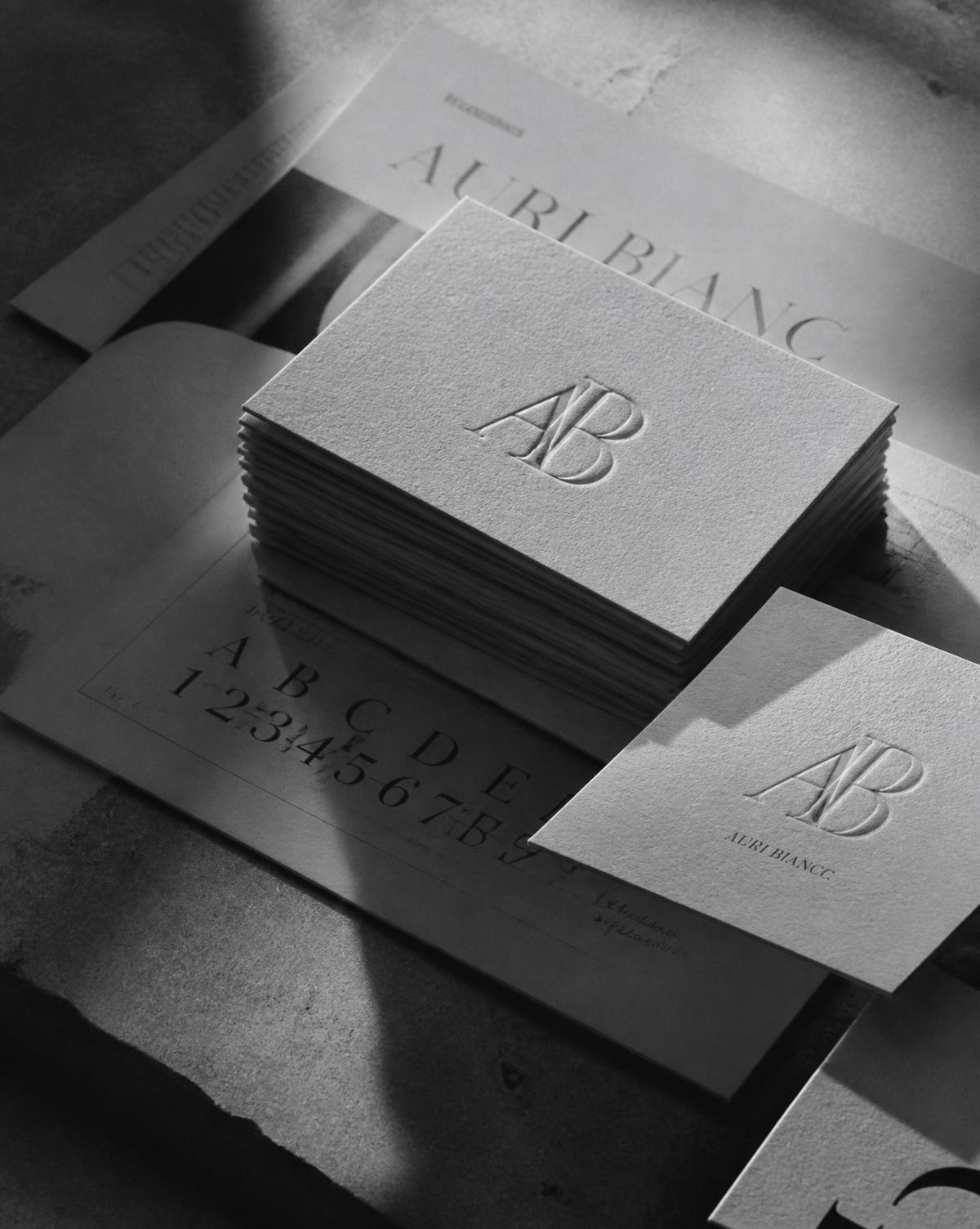Brand identity materials in black and white